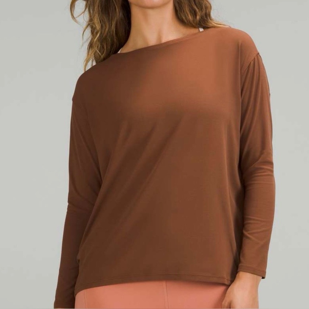 Lululemon Rust Long Sleeve Top. Flowy back in action quarter sleeve.